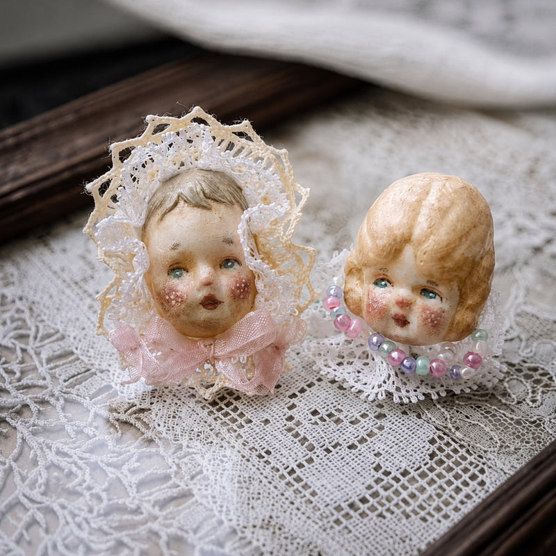Giant Baby & Pumpkin Head Doll Ring