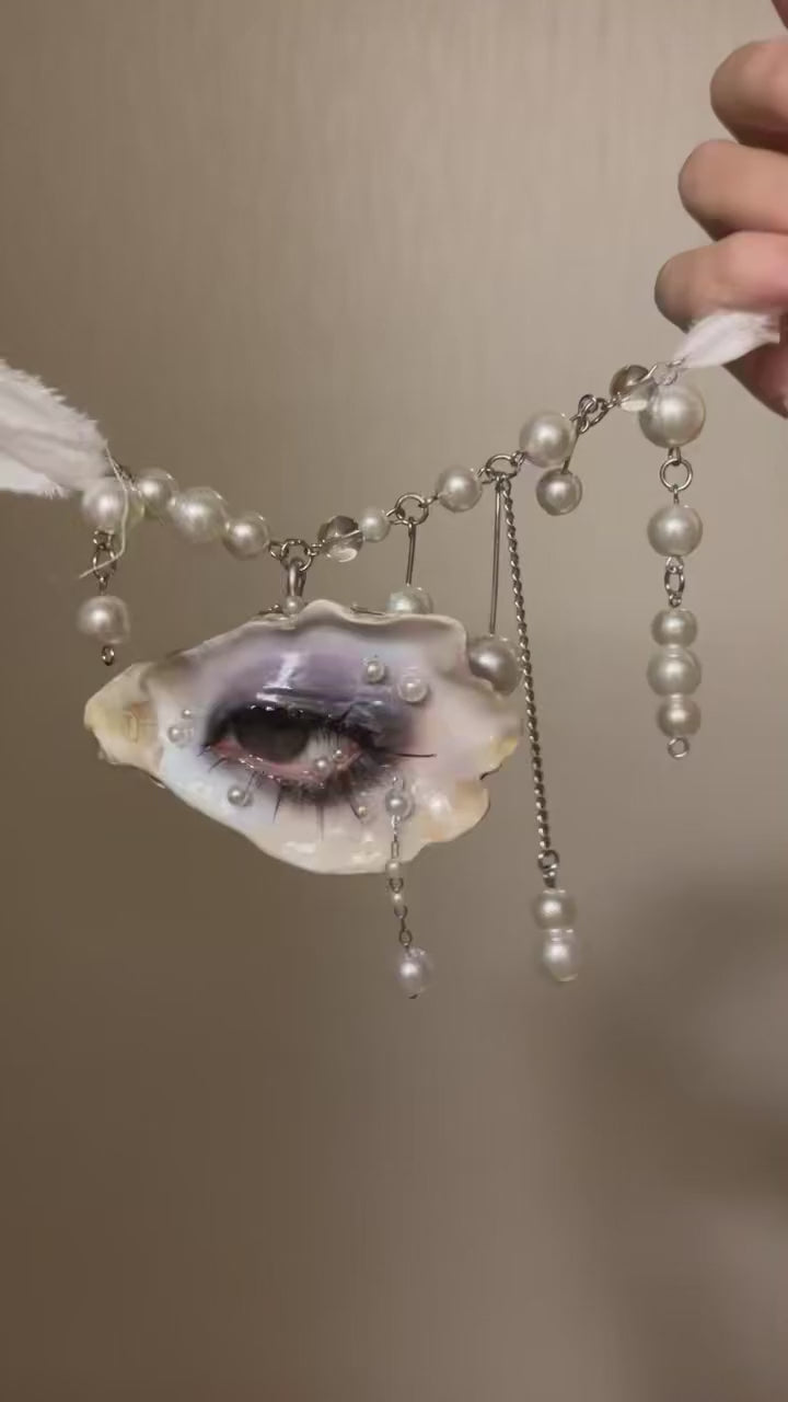 Vespera faux pearl-accented chain necklace movement and details