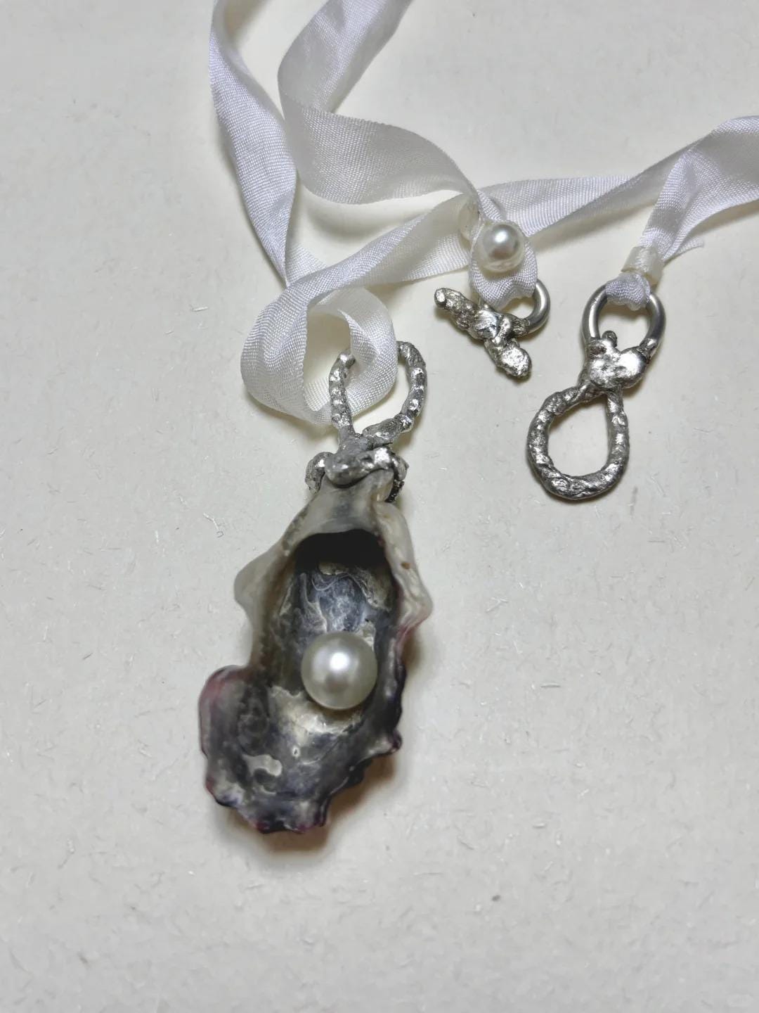 Shell Pearl Talisman — artwork and styling view 2