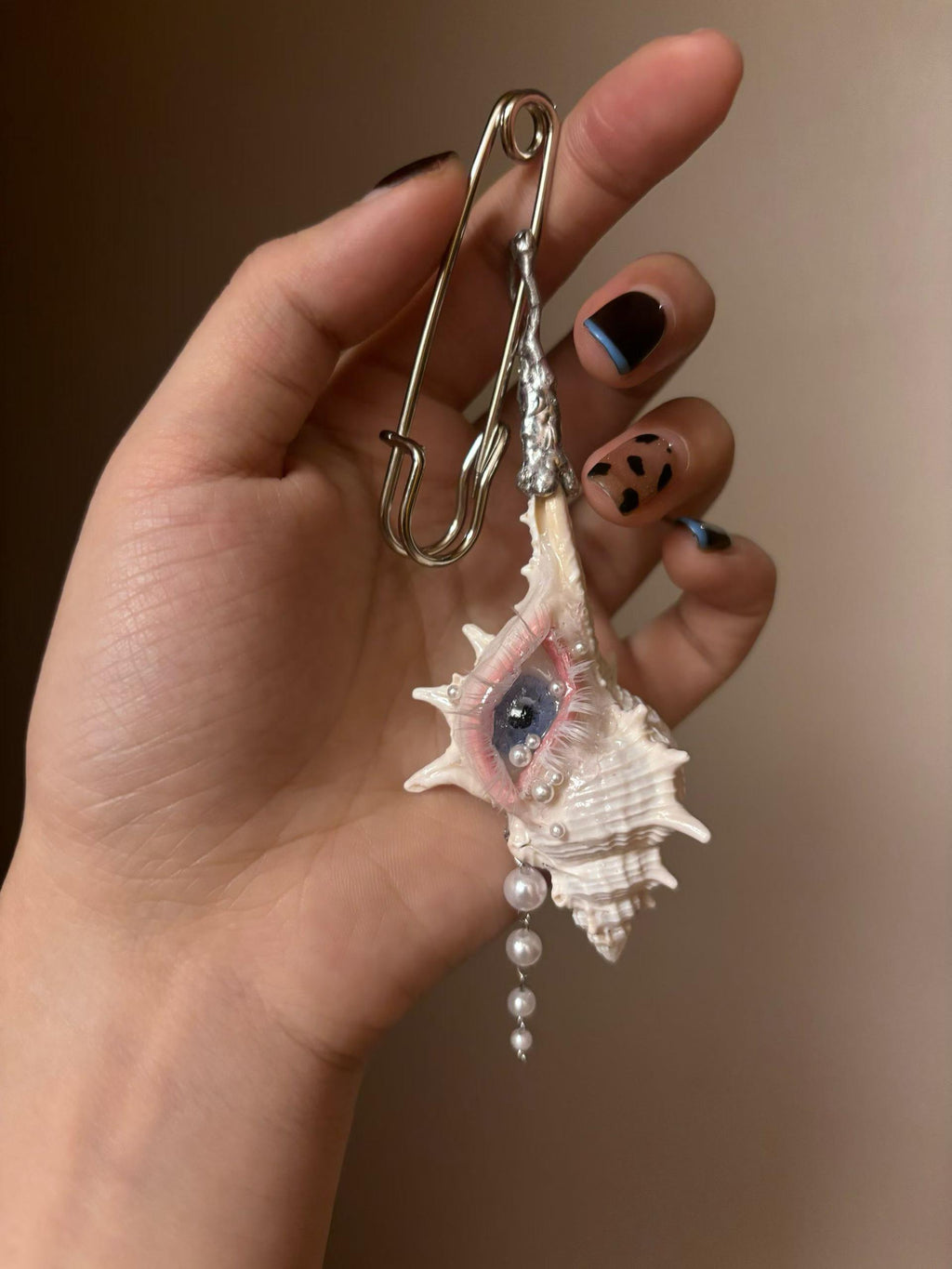 Conch Eye Talisman — artwork and styling view 5