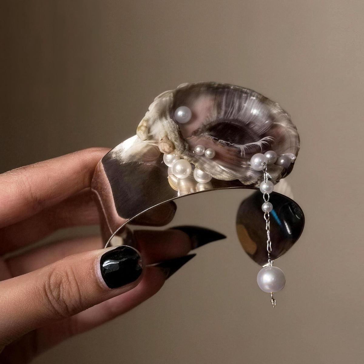 Gilded Oyster Eye Cuff — artwork and styling view 3