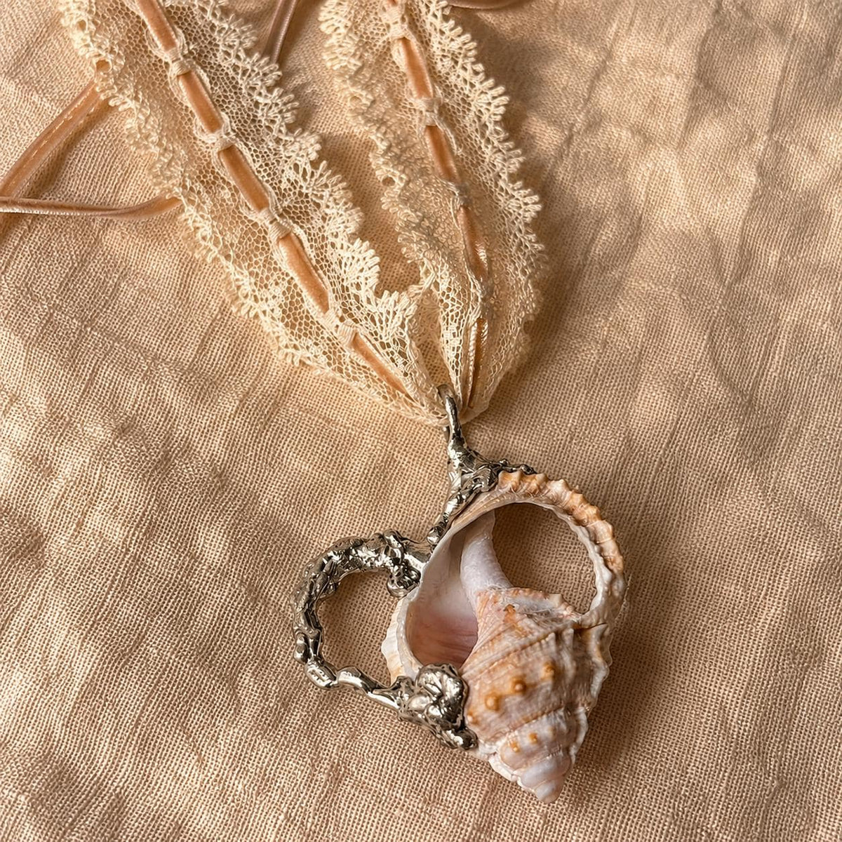 Spiked Conch Loop Talisman — primary artwork view