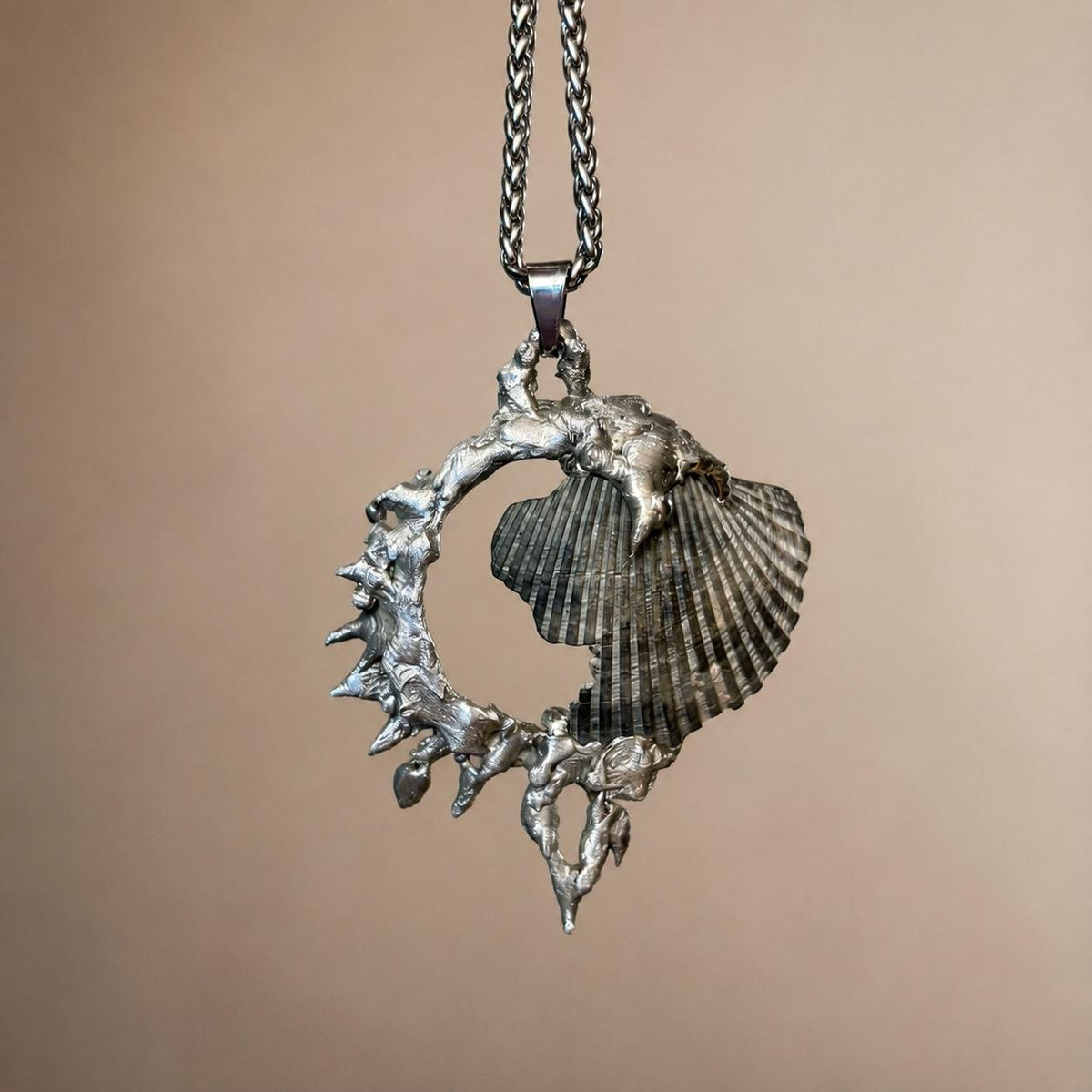 Spiked Conch Loop Talisman — artwork and styling view 2