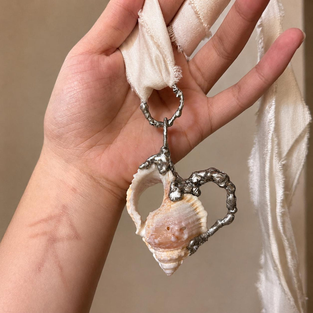 Spiked Conch Loop Talisman — artwork and styling view 3