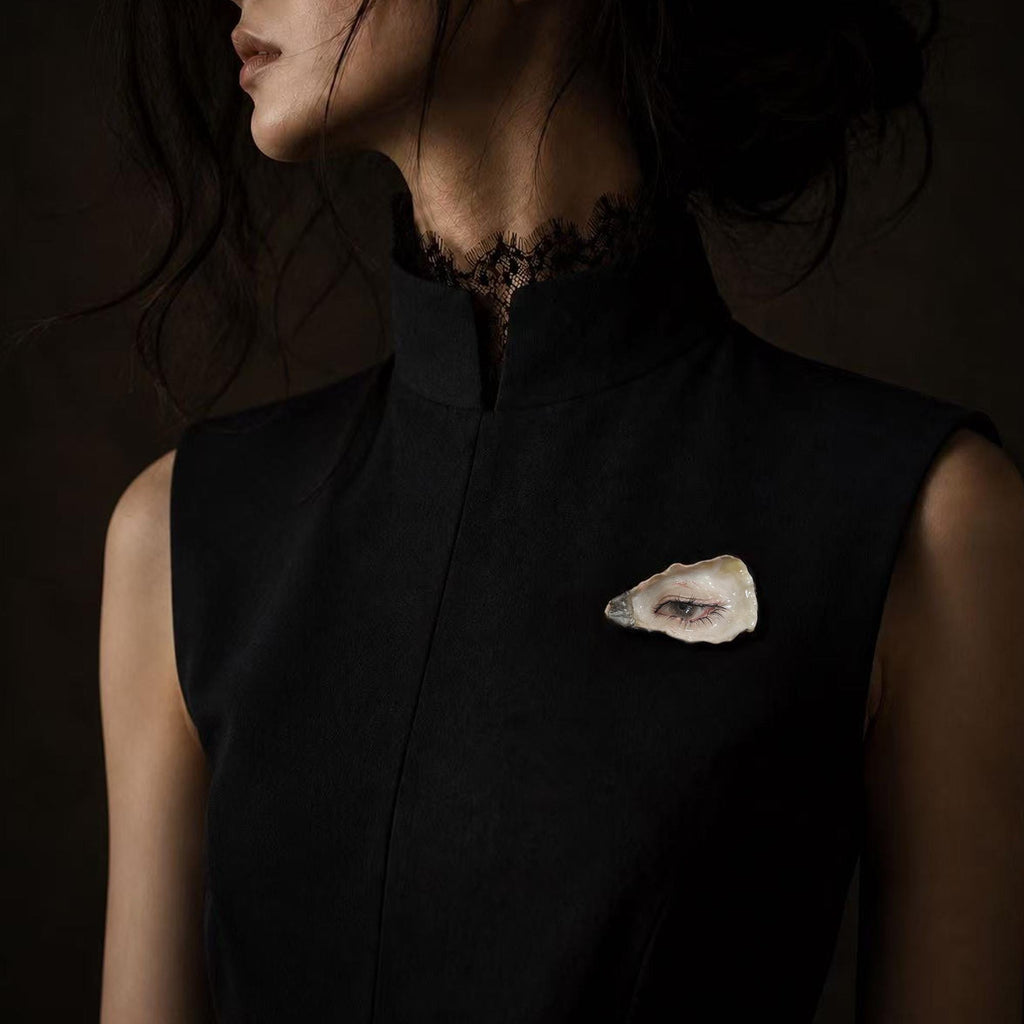 Nyra Black-Lash Oyster Eye — artwork and styling view 2